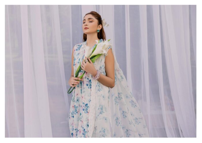 A WOMEN IN FLORAL DRESS BY SANAM SAEED LAWN COLLECTION